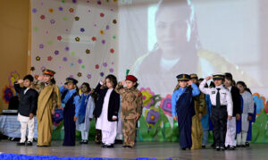 Junior graduates in a group photo with the officials at the Graduation Ceremony 2025 of Islamabad Grammar Schools at Shah Abdul Latif Bhitai Auditorium