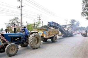 Road construction work is underway on Faisalabad road.