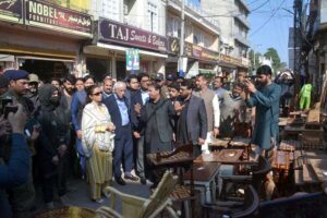 Federal Minister for Maritime Affairs, Qasir Ahmad Sheikh, addresses furniture traders and listens to their concerns at the furniture market.