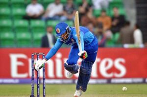 Afghanistan player Ibrahim Zadran plays a shot during the ICC Champions Trophy one-day international (ODI) cricket match between Afghanistan and England at the Gaddafi Stadium.