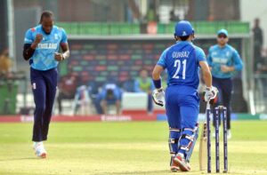 Afghanistan player Ibrahim Zadran plays a shot during the ICC Champions Trophy one-day international (ODI) cricket match between Afghanistan and England at the Gaddafi Stadium.