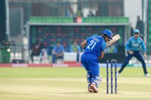 Afghanistan player Ibrahim Zadran plays a shot during the ICC Champions Trophy one-day international (ODI) cricket match between Afghanistan and England at the Gaddafi Stadium.