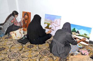 Students participating in a painting competition in connection with Punjab Culture Day organized by the Punjab Council of the Arts, Multan Division.