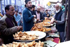 Vendor preparing traditional sweet item (Jalebi) for iftar during holy fasting month of Ramadan near Ghouri VIP in the Federal Capital