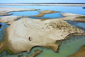 A view of dry riverbeds due to water shortage in the Indus River at Jamshoro.