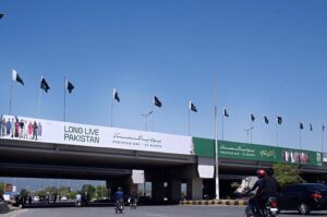 A view of Banners displayed on green belt in connection with Pakistan Day at Constitution Avenue in the Federal Capital.