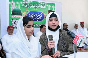 A student reciting a Naat during the Natiya Mushaira at Begum Nusrat Bhutto Government Girls Degree College.