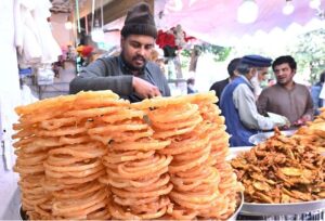 A vendor display and sells traditional food items during holy fasting month of Ramadan at Aabpara in the Federal Capital