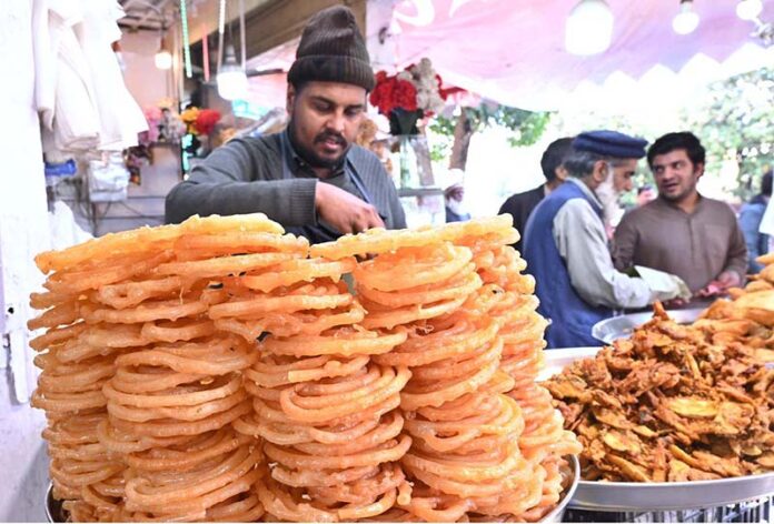 A vendor display and sells traditional food items during holy fasting month of Ramadan at Aabpara in the Federal Capital