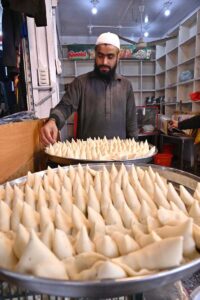 A vendor display and sells traditional food items during holy fasting month of Ramadan at Aabpara in the Federal Capital