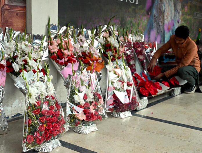 A vendor display flower bouquets to attract costumers near Aabpara in the Federal Capital