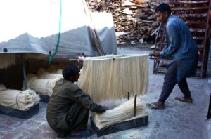 Workers are busy preparing vermicelli (Sawiyyan) at a local food factory, as these sweet delicacies are in high demand on the eve of Eid-ul-Fitr, a festive occasion celebrated with traditional dishes and joyous gatherings.