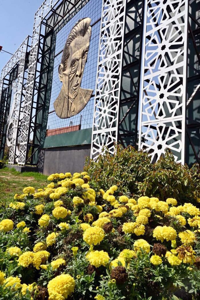 An attractive view of seasonal flowers flouring and blooming at roadside greenbelt to mark the Spring Season in the Federal Capital