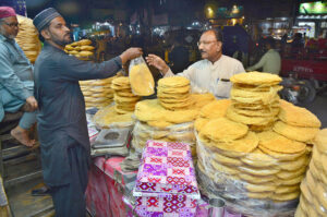 A vendor sells Ramadan delicacy Phani at his shop, a special dish for Iftar and Sehar.