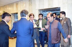 Federal Minister for Railways Muhammad Hanif Abbasi is being met by Secretary Railways Syed Mazhar Ali Shah.