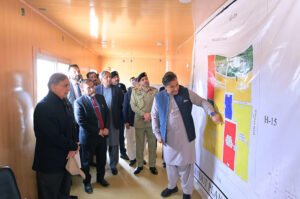 Prime Minister Muhammad Shehbaz Sharif being briefed about the layout plan of Danish University of Emerging Sciences