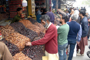 Vendors prepare traditional food item Phani in preparation of the first day of the holy month of Ramadan