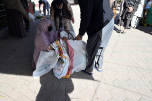 Woman selling shopping bags in connection with Womens Day at Sasta Ramzan Bazar G-6 in the Federal Capital.