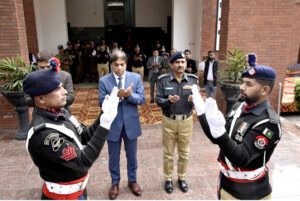 Federal Minister Hanif Abbasi is being briefed by the IG Railways Police on the performance of the Railway Police and the security of the Railways