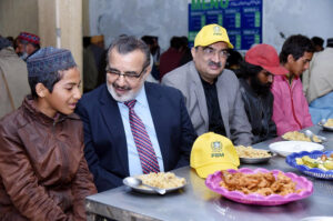 Managing Director Pakistan Bait-ul-Mal (PBM), Senator Capt. Shaheen Khalid Butt distributing Iftaar Boxes among the beneficiaries