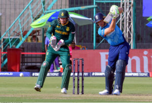 Jos Buttler of England plays a shot during the ICC Champions Trophy 2025 match between South Africa and England at National Stadium