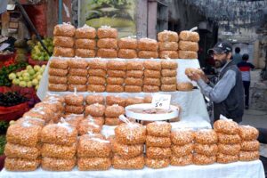 A vendor displaying ‘Pakoriyan’ to be used for ‘chaat’ to attract customers during holy fasting month of Ramazan