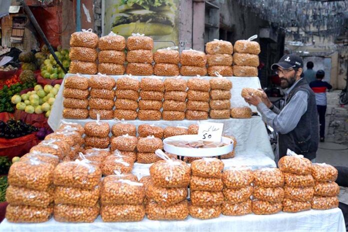 A vendor displaying ‘Pakoriyan’ to be used for ‘chaat’ to attract customers during holy fasting month of Ramazan