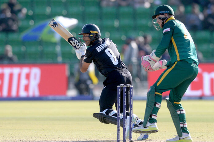 New Zealand batter Racin Ravindra playing shot during the ICC Champions Trophy one-day international (ODI) semi-final cricket match between New Zealand and South Africa at the Gaddafi Stadium