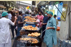 A vendor displaying ‘Pakoriyan’ to be used for ‘chaat’ to attract customers during holy fasting month of Ramazan