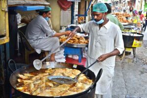 A vendor displaying ‘Pakoriyan’ to be used for ‘chaat’ to attract customers during holy fasting month of Ramazan