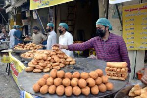 A vendor displaying ‘Pakoriyan’ to be used for ‘chaat’ to attract customers during holy fasting month of Ramazan