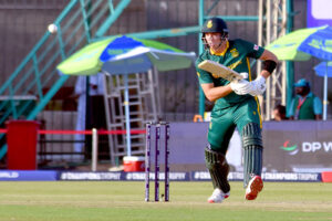 South Africa's Ryan Rickelton plays a shot during the ICC Champions Trophy one-day international (ODI) cricket match between England and South Africa at National Stadium