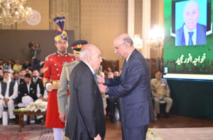 President Asif Ali Zardari conferring the award of Hilal-i-Imtiaz upon Khawaja Anver Majid in recognition of his social services, at the investiture ceremony to confer the insignias of Civil Awards, at Aiwan-e-Sadr.