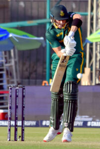 South Africa's Ryan Rickelton plays a shot during the ICC Champions Trophy one-day international (ODI) cricket match between England and South Africa at National Stadium