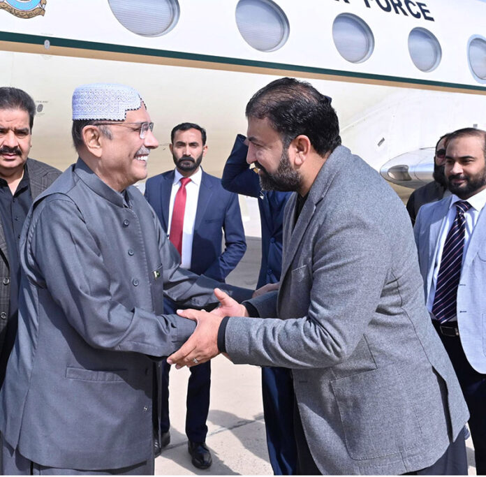 President Asif Ali Zardari being welcomed upon his arrival at Quetta Airport by the Chief Minister Balochistan Mir Sarfraz Bugti