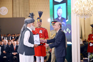 President Asif Ali Zardari conferring the award of Hilal-i-Shuja'at (posthumous) upon Additional SHO Adnan Afridi Shaheed in recognition of his gallantry, at the investiture ceremony to confer the insignias of Civil Awards, at Aiwan-e-Sadr. His award is being received by his father.