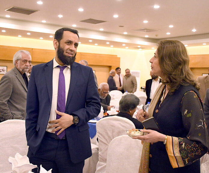 Federal Minister for Information and Broadcasting Atta Tarar at an Iftar hosted by former Federal Information Secretary Anwer Mahmood for senior media persons and senior serving and retired officers