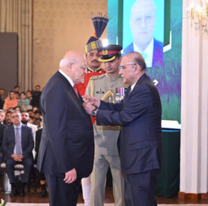 President Asif Ali Zardari conferring the award of Hilal-i-Imtiaz upon Mr Hussain Dawood in recognition of his services in the field of Philanthropy, at the investiture ceremony to confer the insignias of Civil Awards, at Aiwan-e-Sadr.