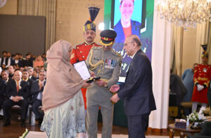 President Asif Ali Zardari conferring the award of Sitara-i-Imtiaz upon Mr Muhammad Hussain (Murad Sadpara) in recognition of his services in the field of Sports (Mountaineering), at the investiture ceremony to confer the insignias of Civil Awards, held at Aiwan-e-Sadr. His widow is receiving his award.