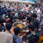 People purchasing traditional food items for Iftar at Pakistan Chowk.