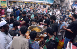 People purchasing traditional food items for Iftar at Pakistan Chowk.