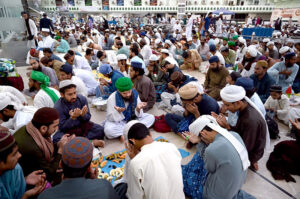 A large number of Muslims offering Dua before breakfast at Iftar sitting in “Itikaf” (Seclusion) at Faizan-e-Madina Mosque old Sabzi Mandi. Special arrangements had been made for the devotees in mosques where the worshipers spend the last 10 days/nights of Ramadan, observing their fasting and performing special prayers