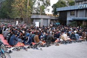 Volunteers serving free food to the fasting people during Iftar in the Islamic fasting month of Ramazan