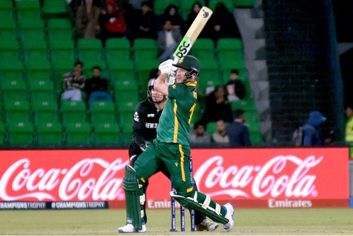 South Africa batter David Miller plays shot (scored century) during the ICC Champions Trophy one-day international (ODI) semi-final cricket match between New Zealand and South Africa at the Gaddafi Stadium. New Zealand won the match by 50 runs and secured its place in final with India