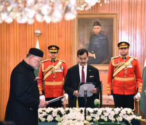 Acting President, Syed Yousuf Raza Gillani administering the oath of office of the Federal Minister to Syed Imran Ahmad Shah, during an oath-taking ceremony, at Aiwan-e-Sadr