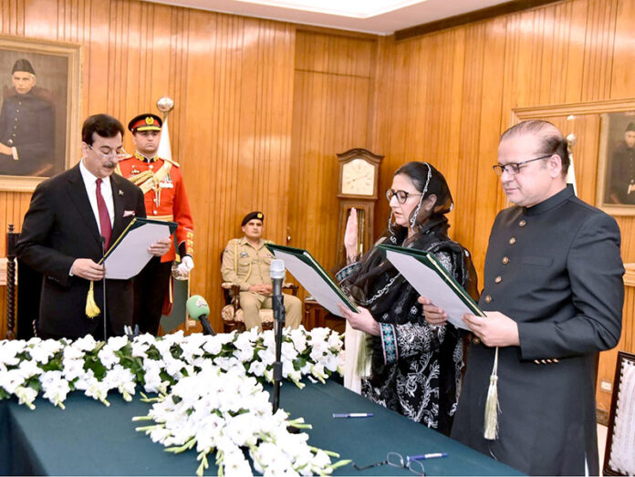 Acting President, Syed Yousuf Raza Gillani administering the oath of office of the Federal Minister to Syed Imran Ahmad Shah, during an oath-taking ceremony, at Aiwan-e-Sadr