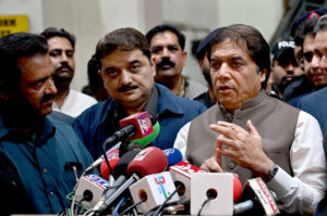 Federal Minister for Railways Muhammad Hanif Abbasi talking the media persons during press conference at Lahore Railway Station