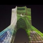 Tehran's Azadi Tower lights up in green and white ahead of Pakistan Day